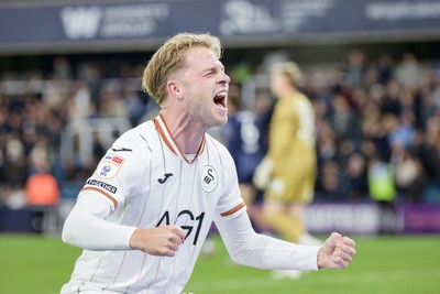 131026 - Millwall v Swansea City - Sky Bet Championship -  Stephen Welsh of Swansea City celebrates Ronald Pereira Martin of Swansea City goal