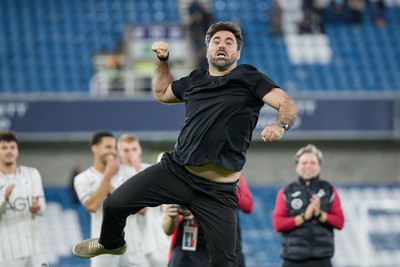 131026 - Millwall v Swansea City - Sky Bet Championship -  Vitor Matos manager of Swansea City celebrates with fans