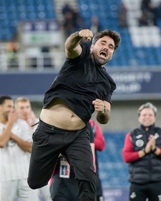 131026 - Millwall v Swansea City - Sky Bet Championship -  Vitor Matos manager of Swansea City celebrates with fans