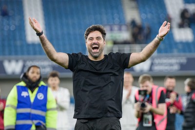 131026 - Millwall v Swansea City - Sky Bet Championship -  Vitor Matos manager of Swansea City celebrates with fans