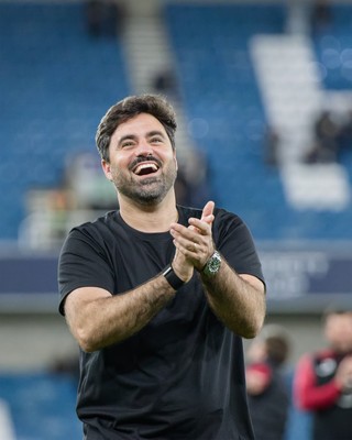 131026 - Millwall v Swansea City - Sky Bet Championship -  Vitor Matos manager of Swansea City celebrates with fans