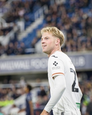 131026 - Millwall v Swansea City - Sky Bet Championship -  Stephen Welsh of Swansea City celebrates Ronald Pereira Martin of Swansea City goal