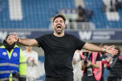 131026 - Millwall v Swansea City - Sky Bet Championship -  Vitor Matos manager of Swansea City celebrates with fans