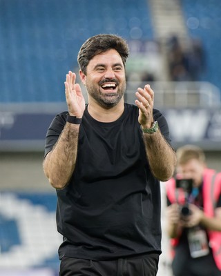 131026 - Millwall v Swansea City - Sky Bet Championship -  Vitor Matos manager of Swansea City celebrates with fans