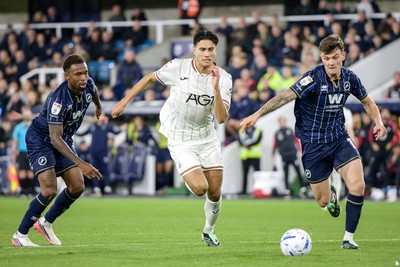 131026 - Millwall v Swansea City - Sky Bet Championship -  Marko Stamenic of Swansea City and Jenson Metcalfe of Millwall in action