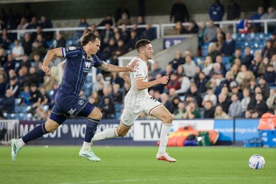 131026 - Millwall v Swansea City - Sky Bet Championship -  Jake Cooper of Millwall and Ross Cameron Stewart of Swansea City in action
