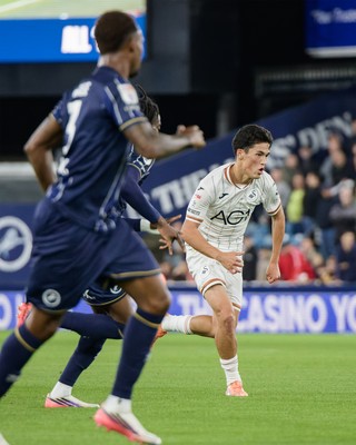 131026 - Millwall v Swansea City - Sky Bet Championship -  Elijah Just of Swansea City in action