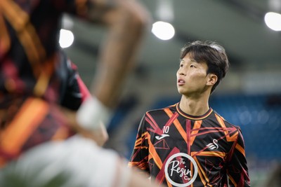 131026 - Millwall v Swansea City - Sky Bet Championship - Jisung Eom of Swansea City warming up