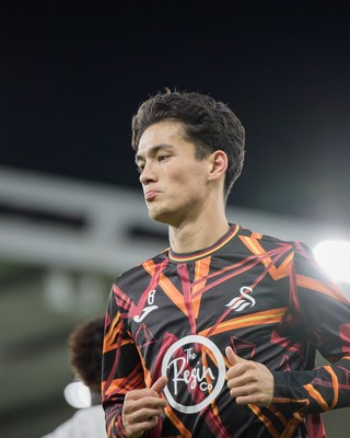 131026 - Millwall v Swansea City - Sky Bet Championship -  Elijah Just of Swansea City warming up