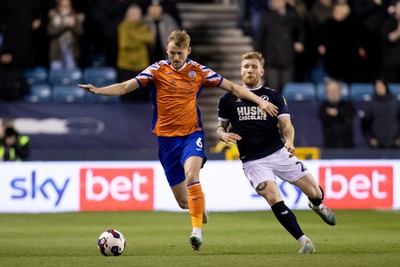 140323 - Millwall v Swansea City - Sky Bet Championship - Harry Darling of Swansea City and Andreas Voglsammer of Millwall battle for the ball