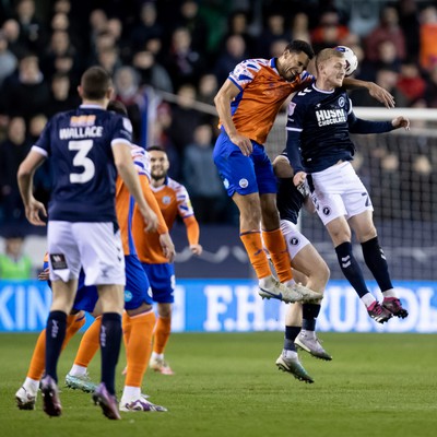 140323 - Millwall v Swansea City - Sky Bet Championship - Ben Cabango of Swansea City battles for the ball