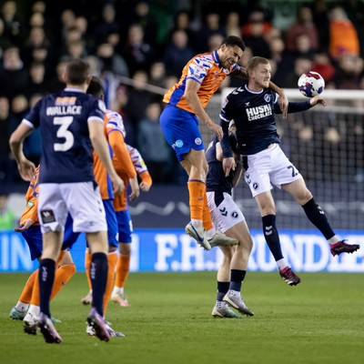 140323 - Millwall v Swansea City - Sky Bet Championship - Ben Cabango of Swansea City battles for the ball