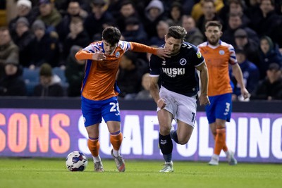 140323 - Millwall v Swansea City - Sky Bet Championship - Liam Walsh of Swansea City and Ryan Leonard of Millwall battle for the ball