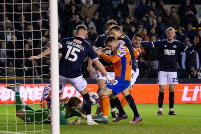 140323 - Millwall v Swansea City - Sky Bet Championship - Charlie Cresswell of Millwall battles for the ball