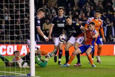 140323 - Millwall v Swansea City - Sky Bet Championship - Charlie Cresswell of Millwall battles for the ball