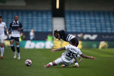 260425 - Millwall v Swansea City - Sky Bet Championship - Ronald of Swansea tackles Zak Sturge of Millwall