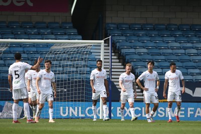 260425 - Millwall v Swansea City - Sky Bet Championship - Swansea City players dejected as Millwall score to make it 1-0