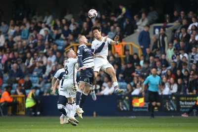 260425 - Millwall v Swansea City - Sky Bet Championship - Eom Ji-Sung of Swansea heads the ball 