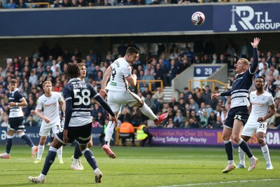 260425 - Millwall v Swansea City - Sky Bet Championship - Zan Vipotnik of Swansea heads towards goal 