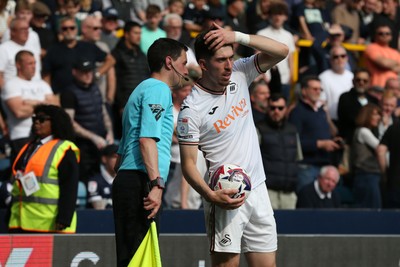 260425 - Millwall v Swansea City - Sky Bet Championship - Josh Key of Swansea talks to the assistant referee
