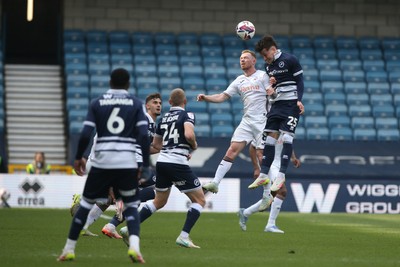 260425 - Millwall v Swansea City - Sky Bet Championship - Lewis O'Brien of Swansea goes up for a header