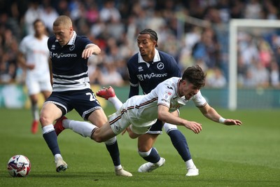260425 - Millwall v Swansea City - Sky Bet Championship - Josh Key of Swansea goes down under a challenge 