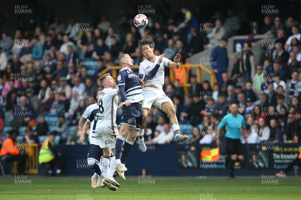 260425 - Millwall v Swansea City - Sky Bet Championship - Eom Ji-Sung of Swansea heads the ball 
