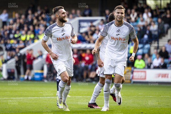 300923 - Millwall v Swansea City - Sky Bet Championship - Matt Grimes of Swansea City celebrates scoring his sides second goal 