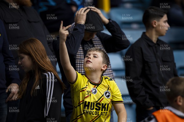 300923 - Millwall v Swansea City - Sky Bet Championship - A young Millwall supporter taunts the away end 