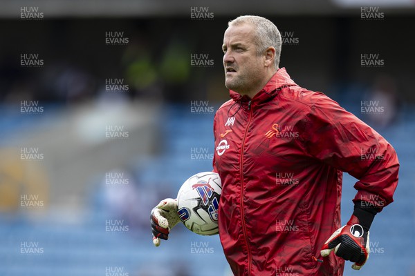 300923 - Millwall v Swansea City - Sky Bet Championship - Swansea City goalkeeping coach Martyn Margetson during the warm up