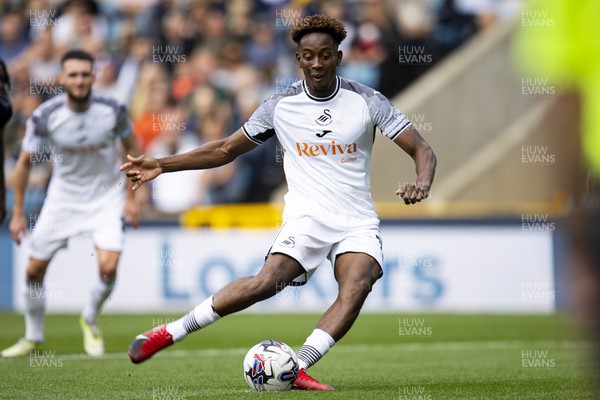 300923 - Millwall v Swansea City - Sky Bet Championship - Jamal Lowe of Swansea City scores his sides first goal from the penalty spot