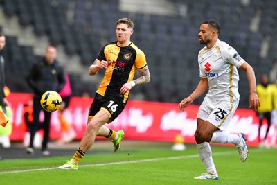 140226 - Milton Keynes Dons v Newport County - Sky Bet League 2 - James Crole of Newport County and Curtis Nelson of MK Dons 