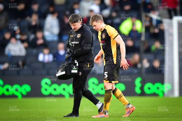 140226 - Milton Keynes Dons v Newport County - Sky Bet League 2 - Sven Sprangler of Newport County is treated for an injury
