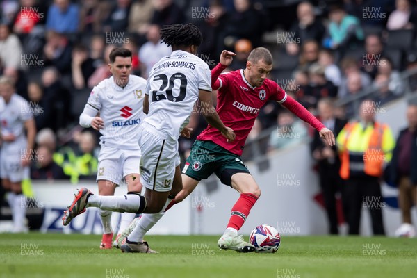 180425 - Milton Keynes Dons v Newport County - Sky Bet League 2 - Newport County’s Shane McLoughlin and MK Dons Kane Thompson-Sommers