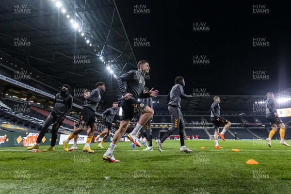 221122 - Milton Keynes Dons v Newport County - Papa Johns Trophy -  Newport players warming up before tonights match against MK Dons 