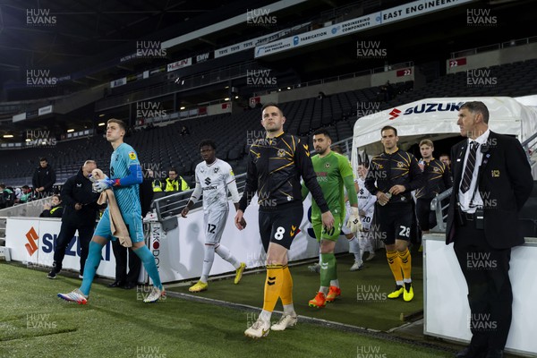 221122 - Milton Keynes Dons v Newport County - Papa Johns Trophy -  Matthew Dolan of Newport County enters the field before todays match against MK Dons 