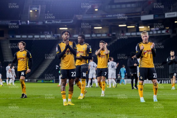 221122 - Milton Keynes Dons v Newport County - Papa Johns Trophy -  Newport County players applaud the fans after their defeat to the MK Dons in the Papa Johns Trophy