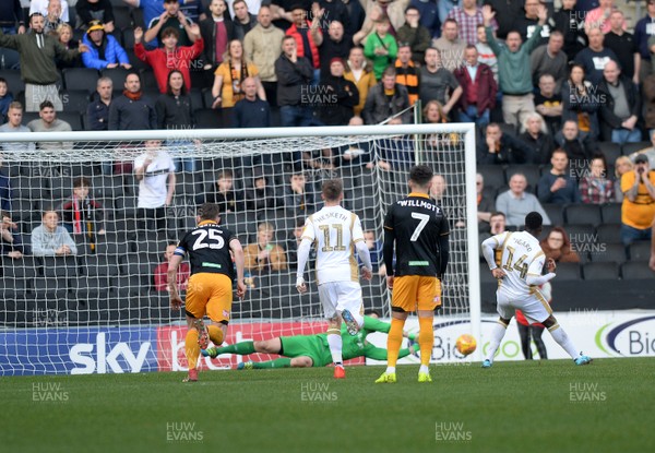 230219 MK Dons v Newport County - Sky Bet League 2 -   Newport Goalkeeper Joe Day dives low to his left to save a penalty from Dons Kieran Agard