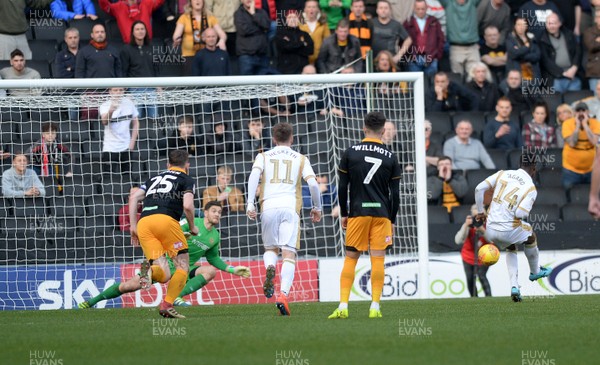 230219 MK Dons v Newport County - Sky Bet League 2 -   Newport Goalkeeper Joe Day dives low to his left to save a penalty from Dons Kieran Agard