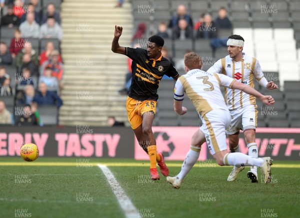 230219 MK Dons v Newport County - Sky Bet League 2 -   Newports Tyreeq Bakinson takes on the Dons defence