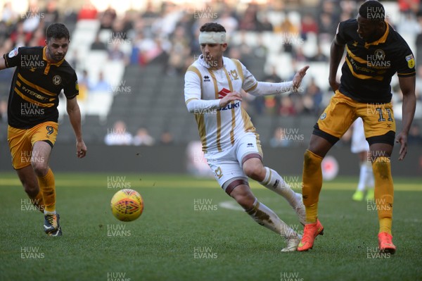 230219 MK Dons v Newport County - Sky Bet League 2 -   MK Dons Mathieu Baudry takes on the Newport defence