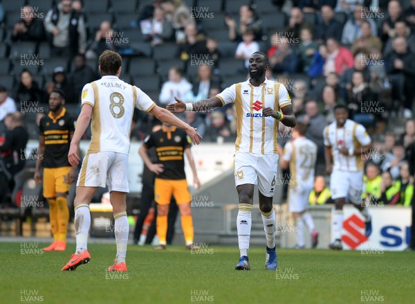 230219 - MK Dons v Newport County - Sky Bet League 2-   Ousseynou Cisse celebrates his goal for MK Dons with Alex Gilbey
