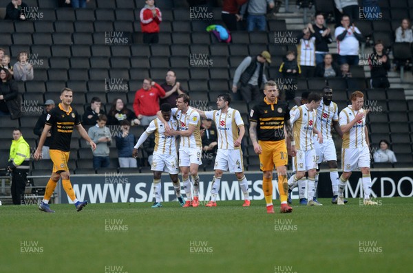 230219 - MK Dons v Newport County - Sky Bet League 2-   MK Dons celebrate their second goal scored by Chuks Aneke