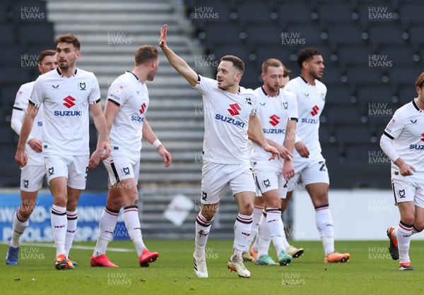 240224 - MK Dons v Newport County, EFL Sky Bet League 2 - Jack Payne of MK Dons is congratulated after scoring the second goal