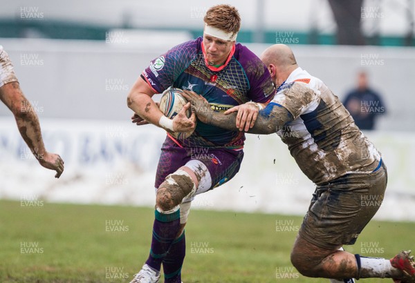 081212 Mogliano v Dragons - Amlin Challenge Cup - Dragons' Andrew Coombs is tackled by Masamiliano Ravalle 