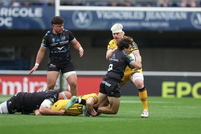 030526 - Montpellier Herault Rugby v Dragons RFC - EPCR Challenge Cup Semi Final - Alexis Bernadet of Montpellier is tackled by Aaron Wainwright of Dragons 