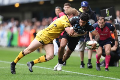 030526 - Montpellier Herault Rugby v Dragons RFC - EPCR Challenge Cup Semi Final - Donovan Taofifenua of Montpellier is tackled by Dai Richards of Dragons 
