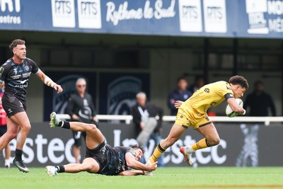 030526 - Montpellier Herault Rugby v Dragons RFC - EPCR Challenge Cup Semi Final - Rio Dyer of Dragons is tackled by Auguste Cadot of Montpellier 