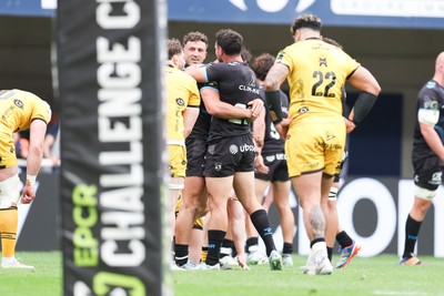 030526 - Montpellier Herault Rugby v Dragons RFC - EPCR Challenge Cup Semi Final - Montpellier players celebrate victory as Dragons look dejected