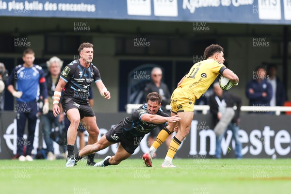 030526 - Montpellier Herault Rugby v Dragons RFC - EPCR Challenge Cup Semi Final - Rio Dyer of Dragons is tackled by Auguste Cadot of Montpellier 